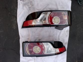 2012-2015 Range Rover Evoque tail lights with accessories OEM.