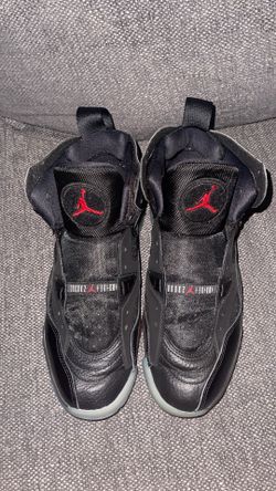 black and red Jordan Jumpman Two Trey sneakers.
