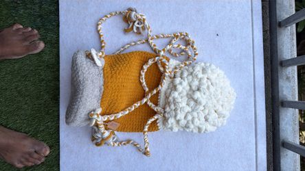 Crocheted wearable art beer cup backpack