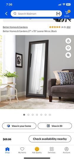 Pair Of Leaning Mirrors