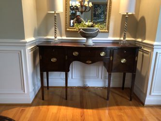 Dining room table and 8 chairs and Sideboard
