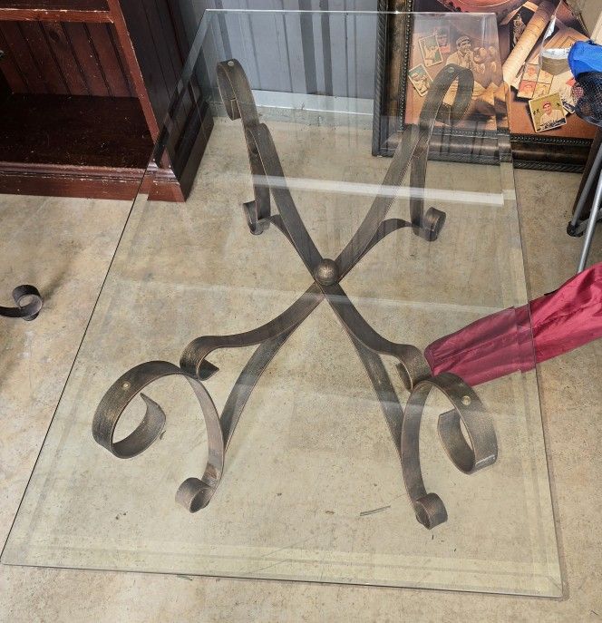 Rustic wrought iron coffee table, beveled glass top 26x50