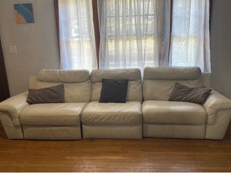 Sectional real leather couch with reclining seats
