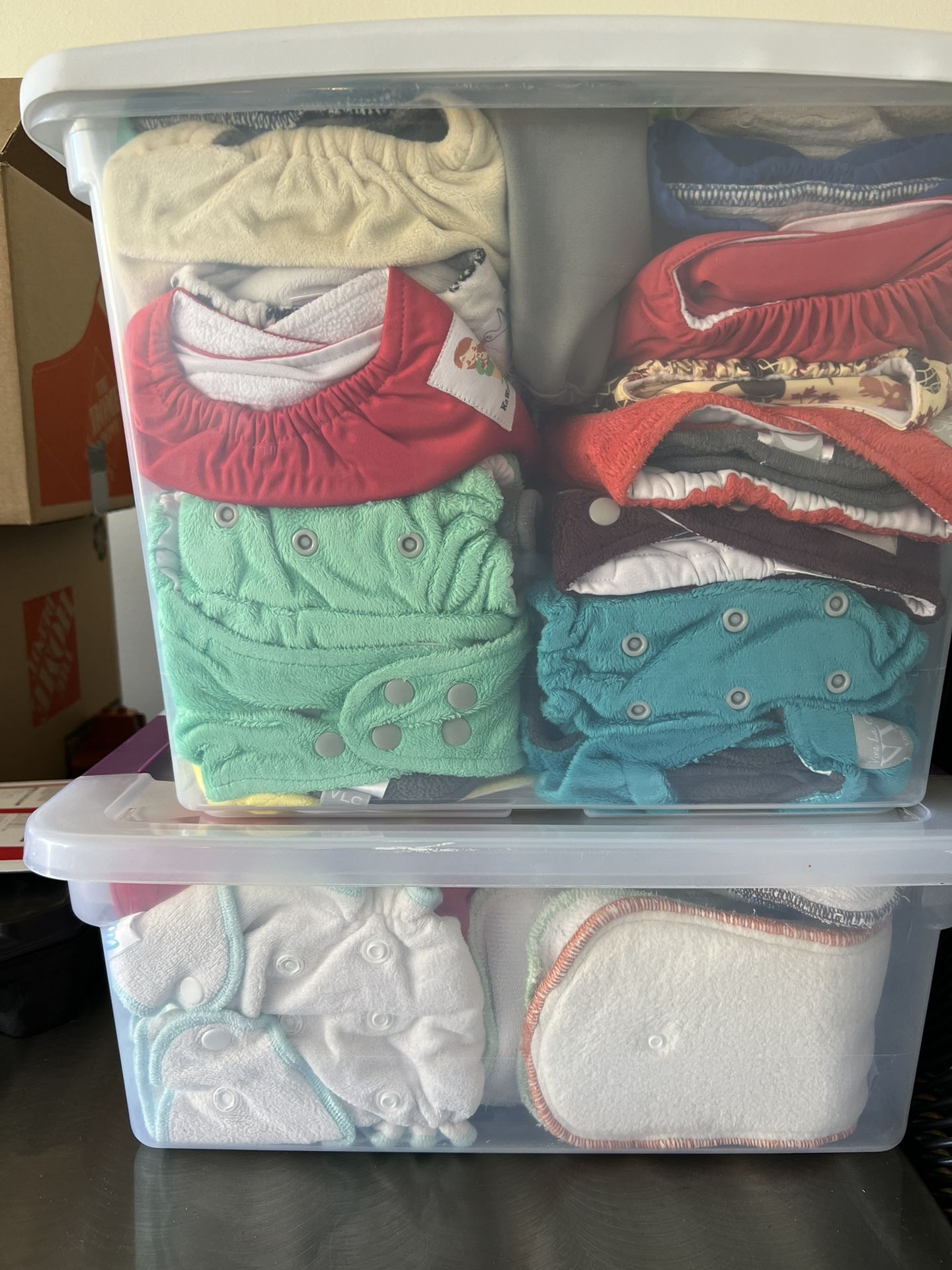 Cloth Diapers And Bin Of Liners