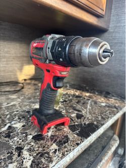 Milwaukee drill works battery not included.