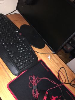 Gaming set up monitor mouse keyboard and mouse pad and head set