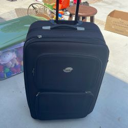 Suitcase Very Cheap $14  With Wheels 