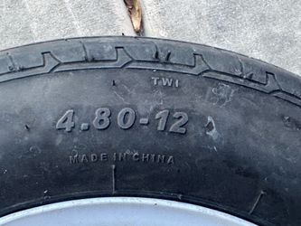 Trailer rin en tire 4/80/12 $60 el par