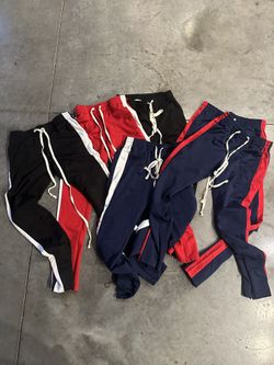 6 Pair Of Striped Sweatpants