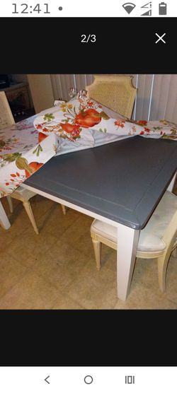 Farmhouse kitchen table with three chairs excellent used condition the wood is strong solid