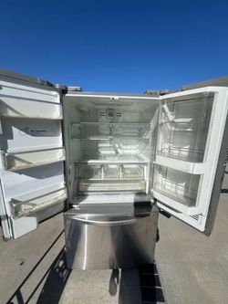 LG stainless steel refrigerator and freezer with ice and water