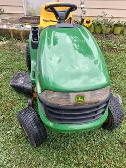 2006 125 Automatic 385.00 hrs everything works great ready to ride jonhdeer tractor