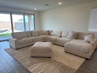 Couch and ottoman and 8x10 rug