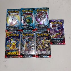 Seven Pokémon Tcg Packs