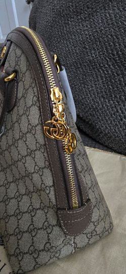 Handbag with long strap