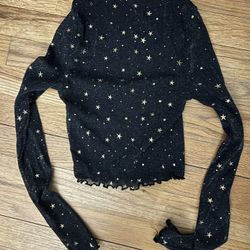 Black long sleeve top with gold stars size extra small 