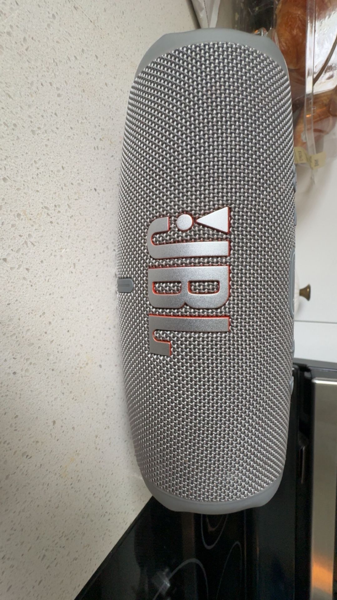 JBL charge 5 waterproof speaker orange and grey