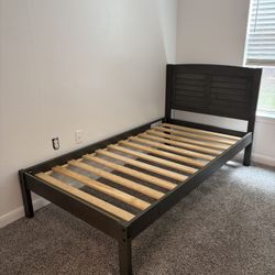 Twin Size bed frame & Mattress with a grey bean bag chair