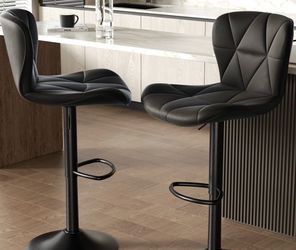 Black leather barstools