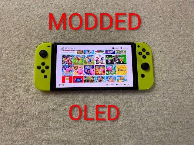 NINTENDO SWITCH OLED + 125 SWITCH GAMES and 7500 OLD SCHOOL RETRO GAMES INSTALLED