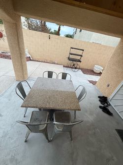 Used real granite Dinner table set with 6 chairs  super heavy  High : 30”  The top is  38” x 38” The chair is seat to floor:17”