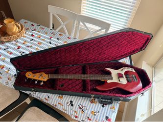 Selling Coffin Case for bass guitar Barely used it is in new condition it has just a little dent on the outside that you cannot even notice. Comes f