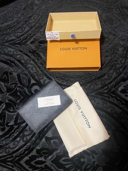 Louis Vuitton Passport Cover / Couverture Passport (model M60181) in the classic Monogram canvas.