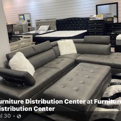 Black Or Gray Sectional With Ottoman