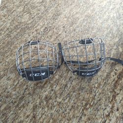 2 Hockey Facemasks 