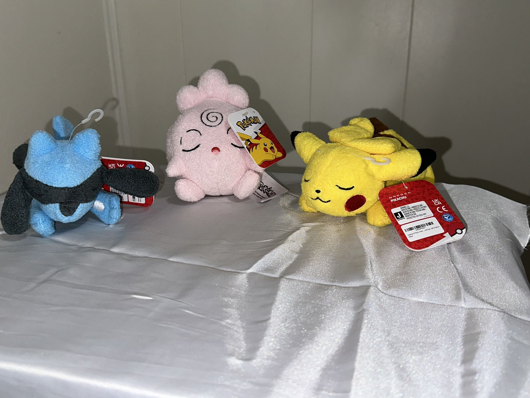 Pokemon sleeping plushies