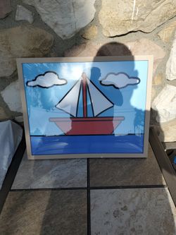 16 by 20 framed Simpson's seal boat picture
