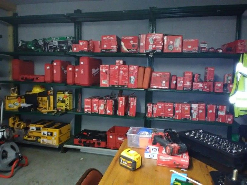 Milwaukee Tool Room Full Of Assorted Hand Tools Accessories Chargers And Packout Kits Prices And Type Of Tools May Vary 