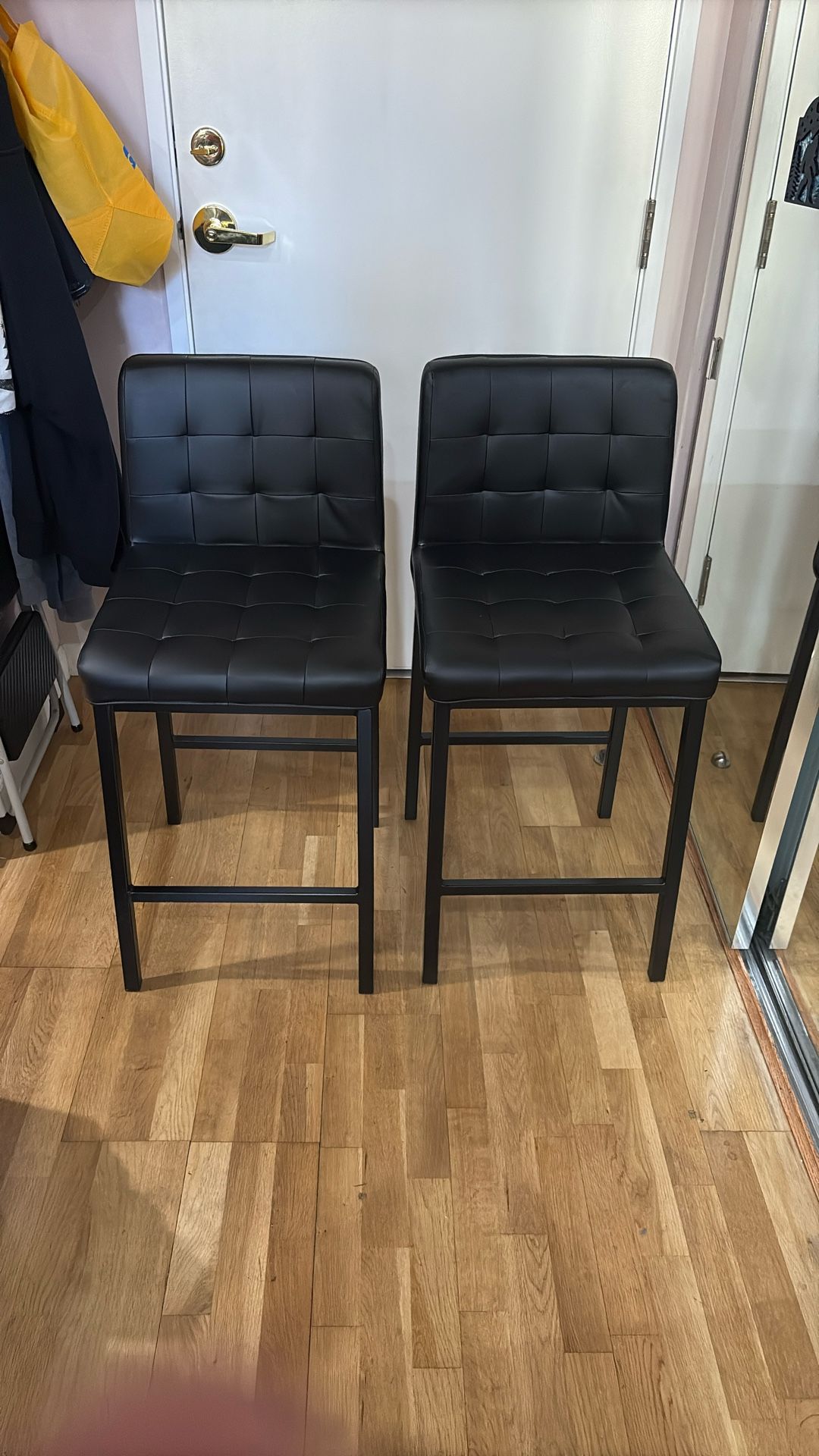 Pair of black bar stools