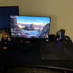 Gaming PC with monitors and keyboard
