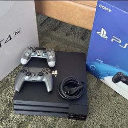 PS4 Pro 1TB Black w/ 2 Controllers in Box