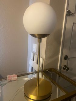Gold mid-century modern globe light