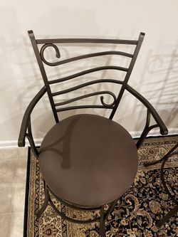 Metal Swivel Barstool with Faux Leather Seat. $70 Each, 2 left