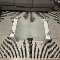 Glass coffee table