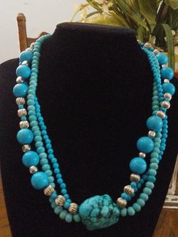 Turquoise and silver three strand necklace