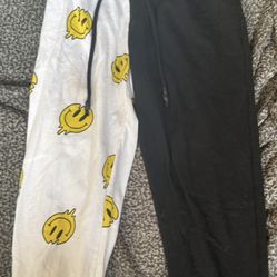 half smiley half black sweatpants