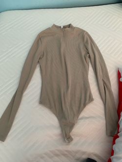 Long sleeve tan one piece zip up
