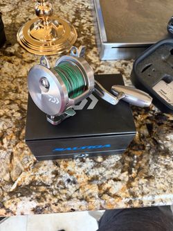 Dawia saltiga 55 2 speed filled with 100lbs maxcutro