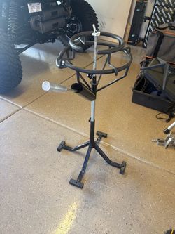 Motorcycle tire changing stand
