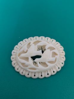 Carved Bone Oval Brooch with Bird Motif - careved bone material, vintage
