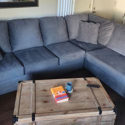Sectional + Ottoman-Living Spaces
