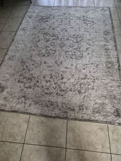 Rug/ Alfombra $25