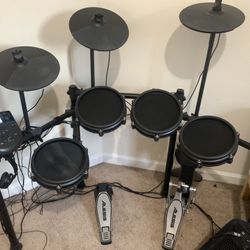 Alesis Nitro Drum Mesh Kit (comes with Headphones,sticks,Mapex Drumthrone & Speaker