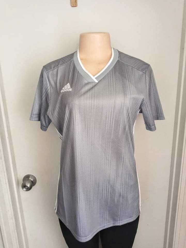 New women’s top size medium from adidas still with tags