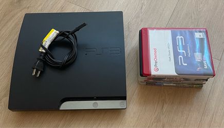 Sony PS3 Slim Console plus 6 Games