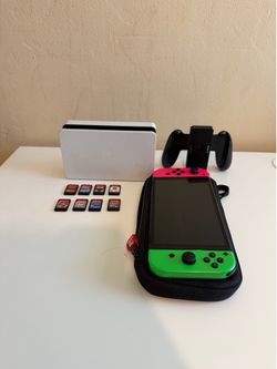 Nintendo Switch OLED White Dock Bundle with 8 Games & Carrying Case